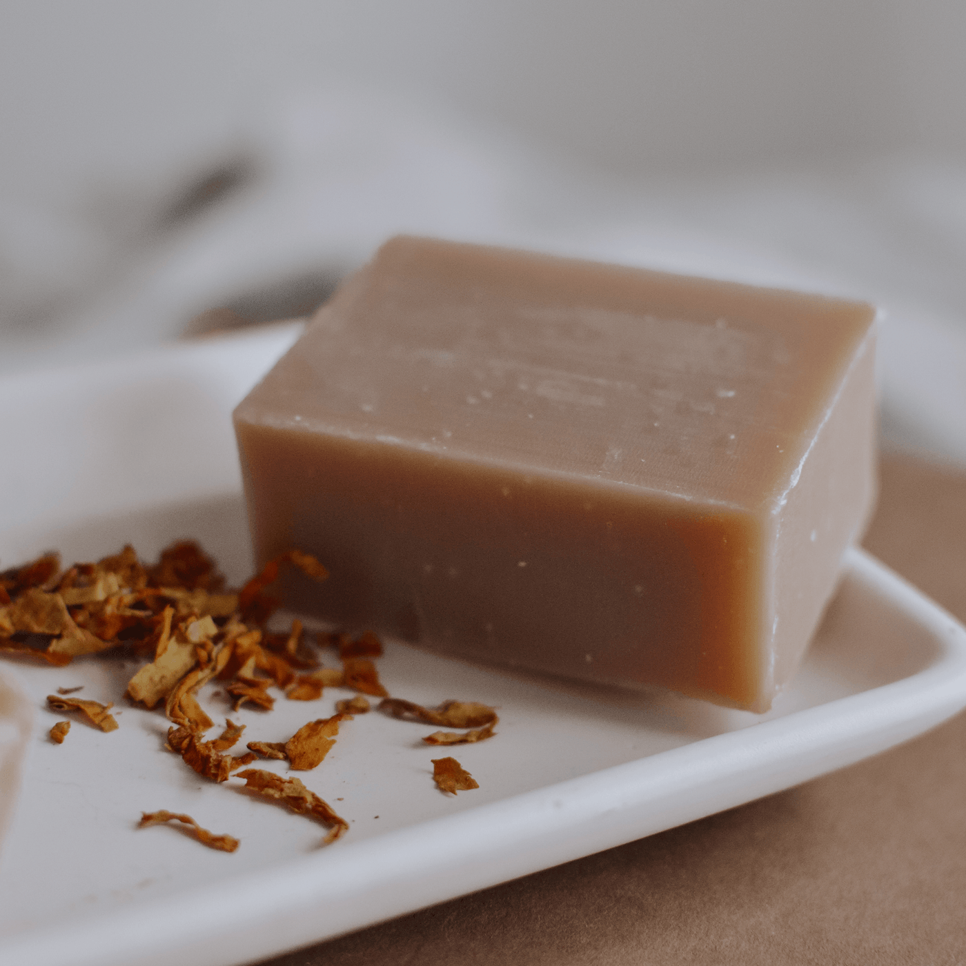 Tobacco patchouli handmade soap with dried tobacco.